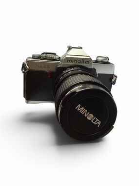 Minolta XG1 35mm SLR Camera in Silver and Black